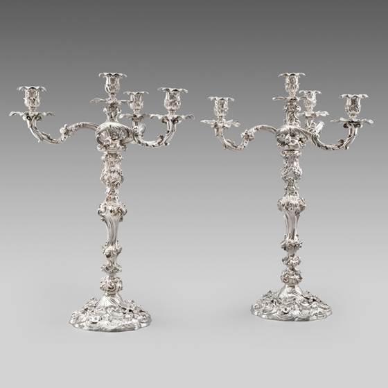 A Pair of Rococo Four-Light Candelabra