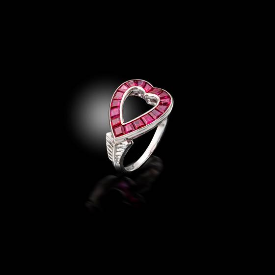 A platinum and ruby ring