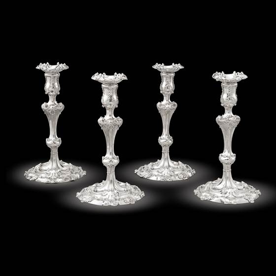 A Set of Four George II Candlesticks