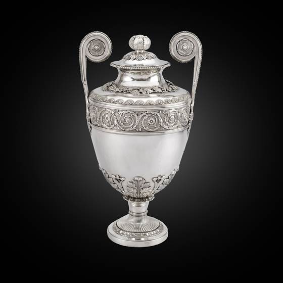 A Twin Handled Urn and Cover