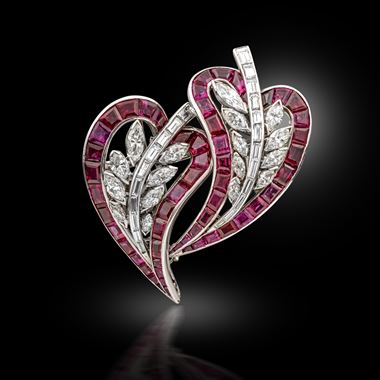 A ruby and diamond double clip brooch, circa 1945
