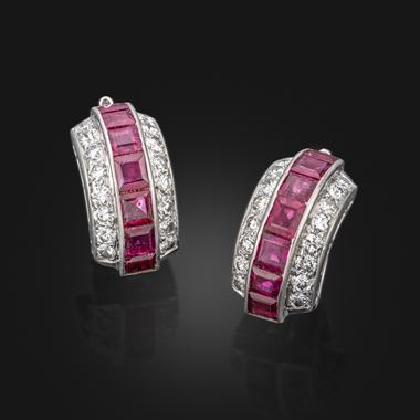 A pair of art deco ruby and diamond ear clips
