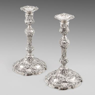 A Pair of Superb Rococo Candlesticks