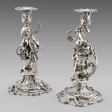 A Pair of Figural Candlesticks