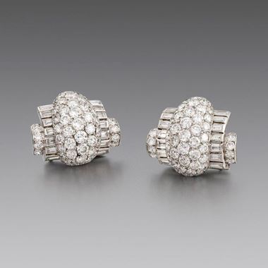 A Pair of Stylish Art Deco Diamond Clip Brooches and Bangle