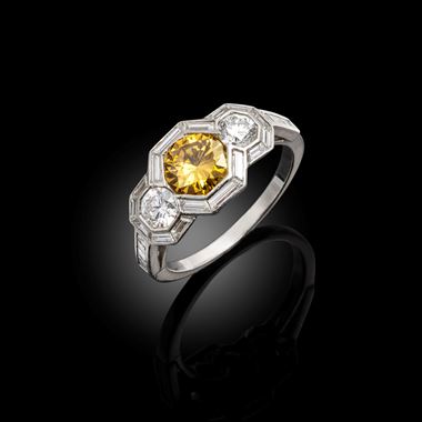 A mid century art deco-style brownish-yellow diamond ring