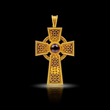 A Gothic Revival gold and amethyst cross, circa 1879