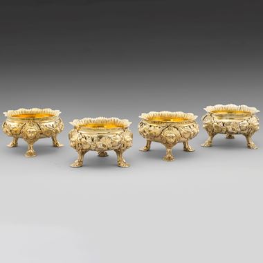 A Set of Four Silver-gilt Nautical and Lion Mask Salts