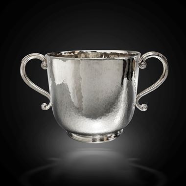 A modern porringer with double scrolled handles