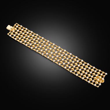 A mid-century gold and diamond bracelet