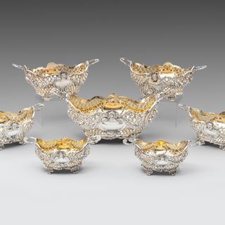 A Suite of Seven Victorian Silver Baskets 