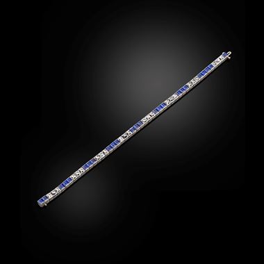 An early 20th century sapphire and French cut diamond line bracelet