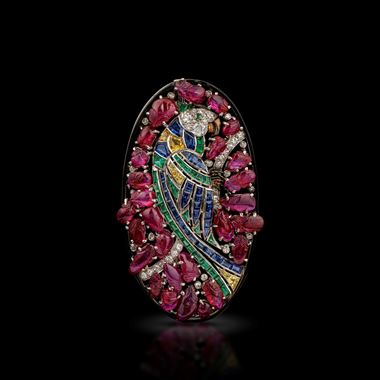 An art-deco tutti frutti and gem-set macaw brooch 