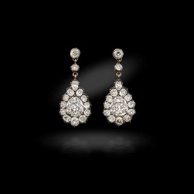 A pair of antique diamond earrings, circa 1890