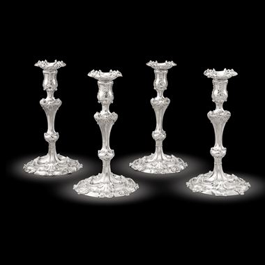A Set of Four George II Candlesticks