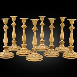 A Rare & Extremely Fine Set of Eight Regency Candlesticks 