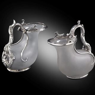 A Pair of Silver-Mounted Ascos Jugs