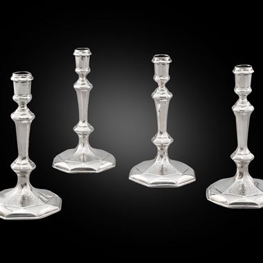 A Set of Four Britannia Candlesticks