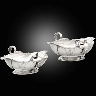 A pair of George I double lipped sauce boats, London, 1717