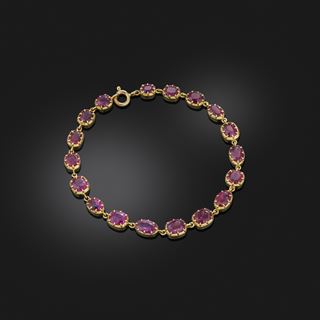 A Gold and Ruby Bracelet 