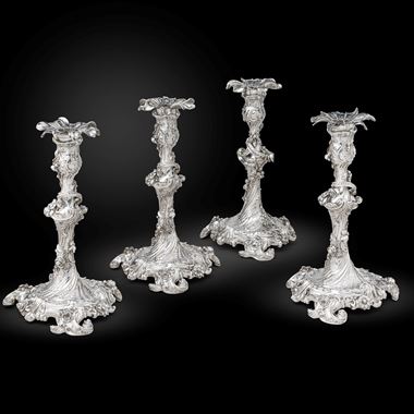 An Exquisite Set of Four Rococo Candlesticks