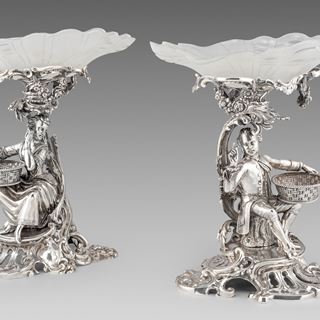 An Elegant Pair of Figural Comports