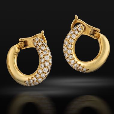 A pair of gold and diamond hoops