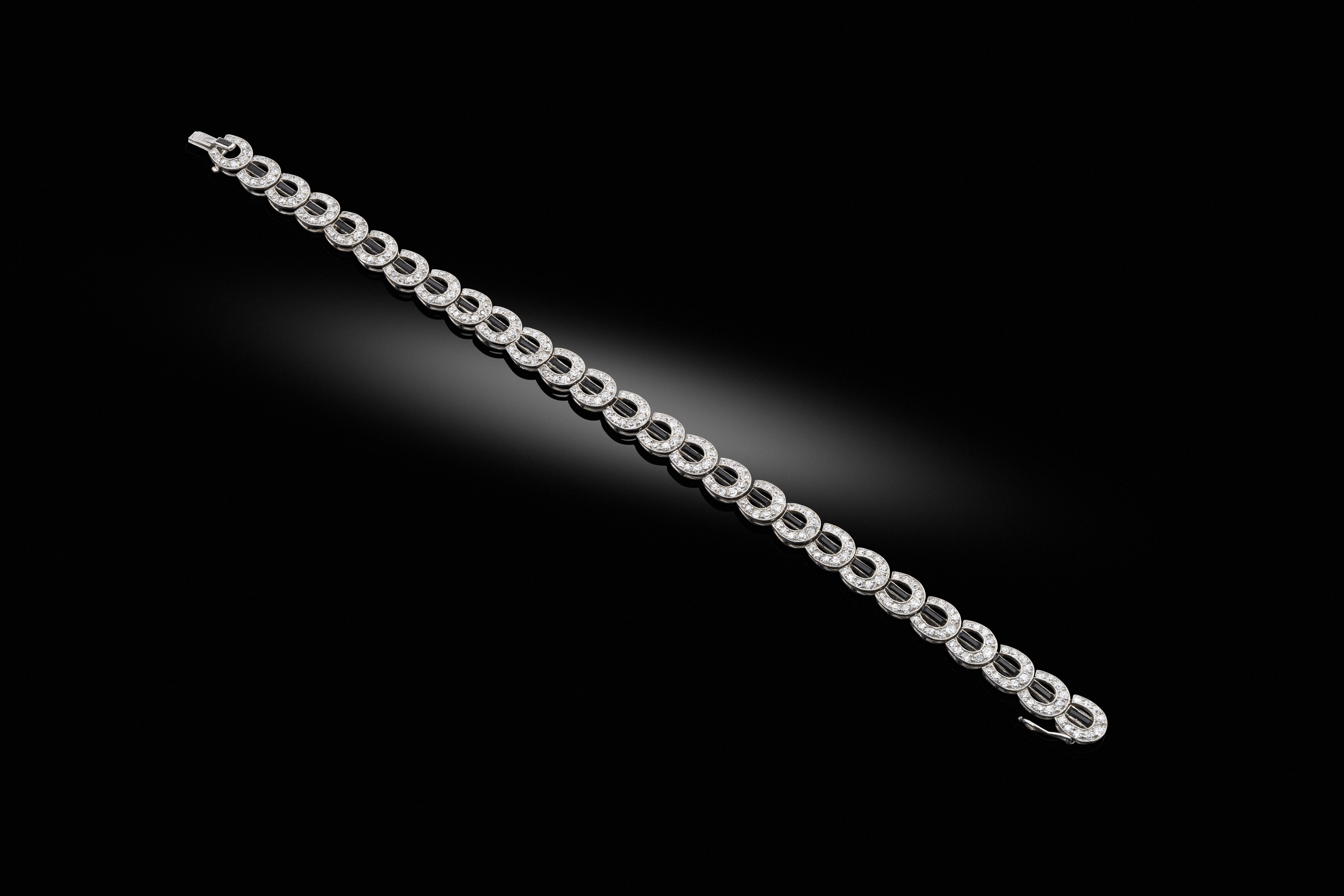 A Fine Early Art Deco Onyx and Diamond Bracelet