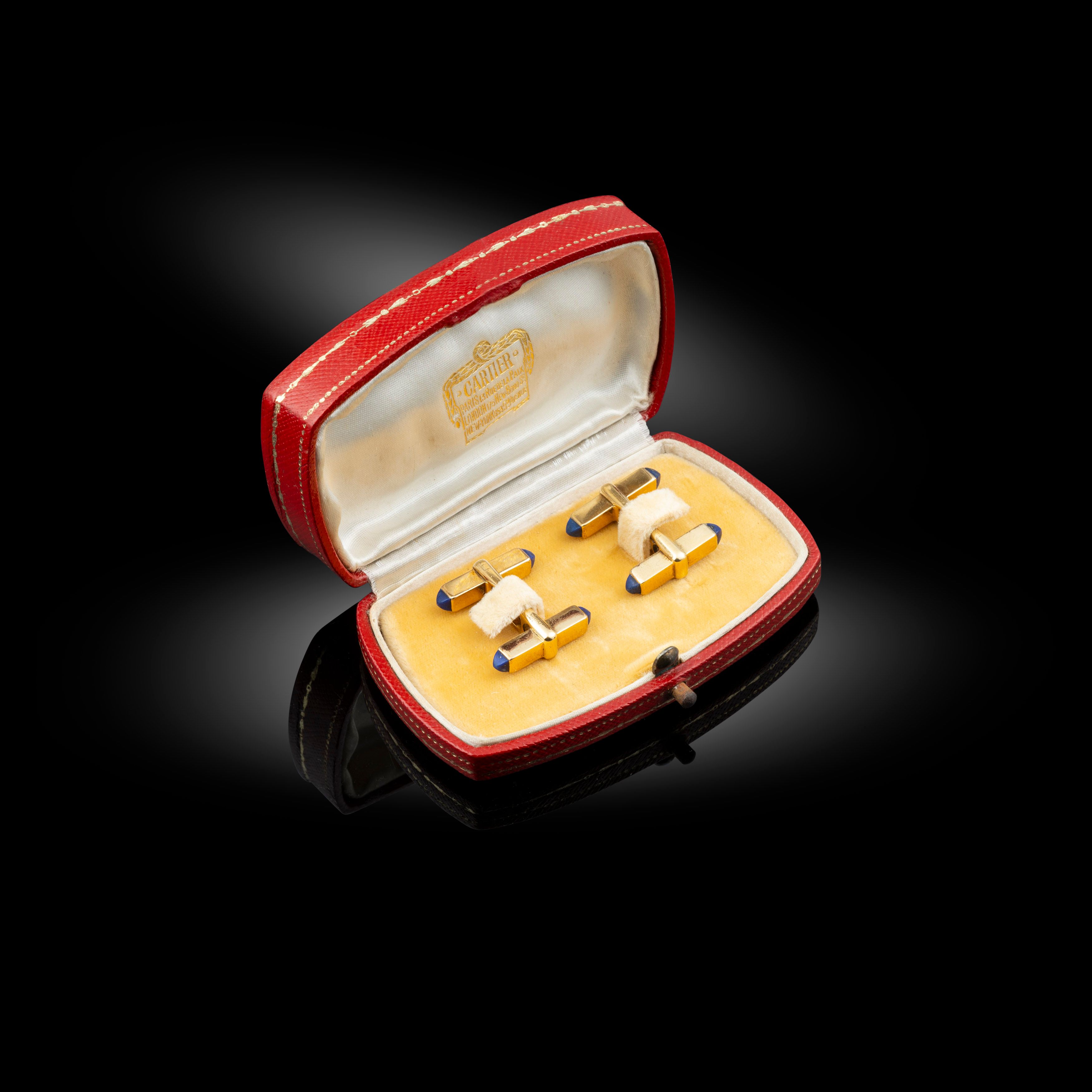 A pair of gold and lapis lazuli baton cufflink, circa 1935