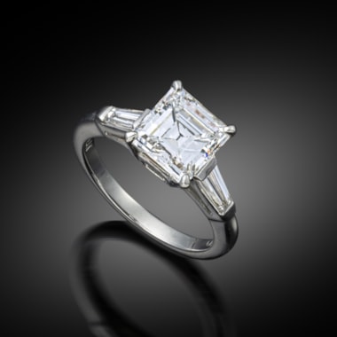 A square emerald cut diamond ring