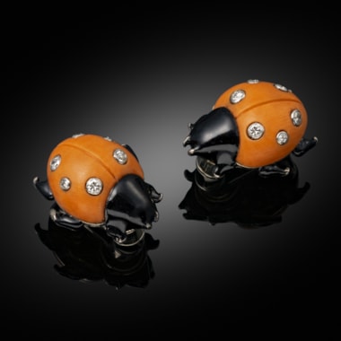 A pair of mid 20th century coral, enamel and diamond ladybird ear clips