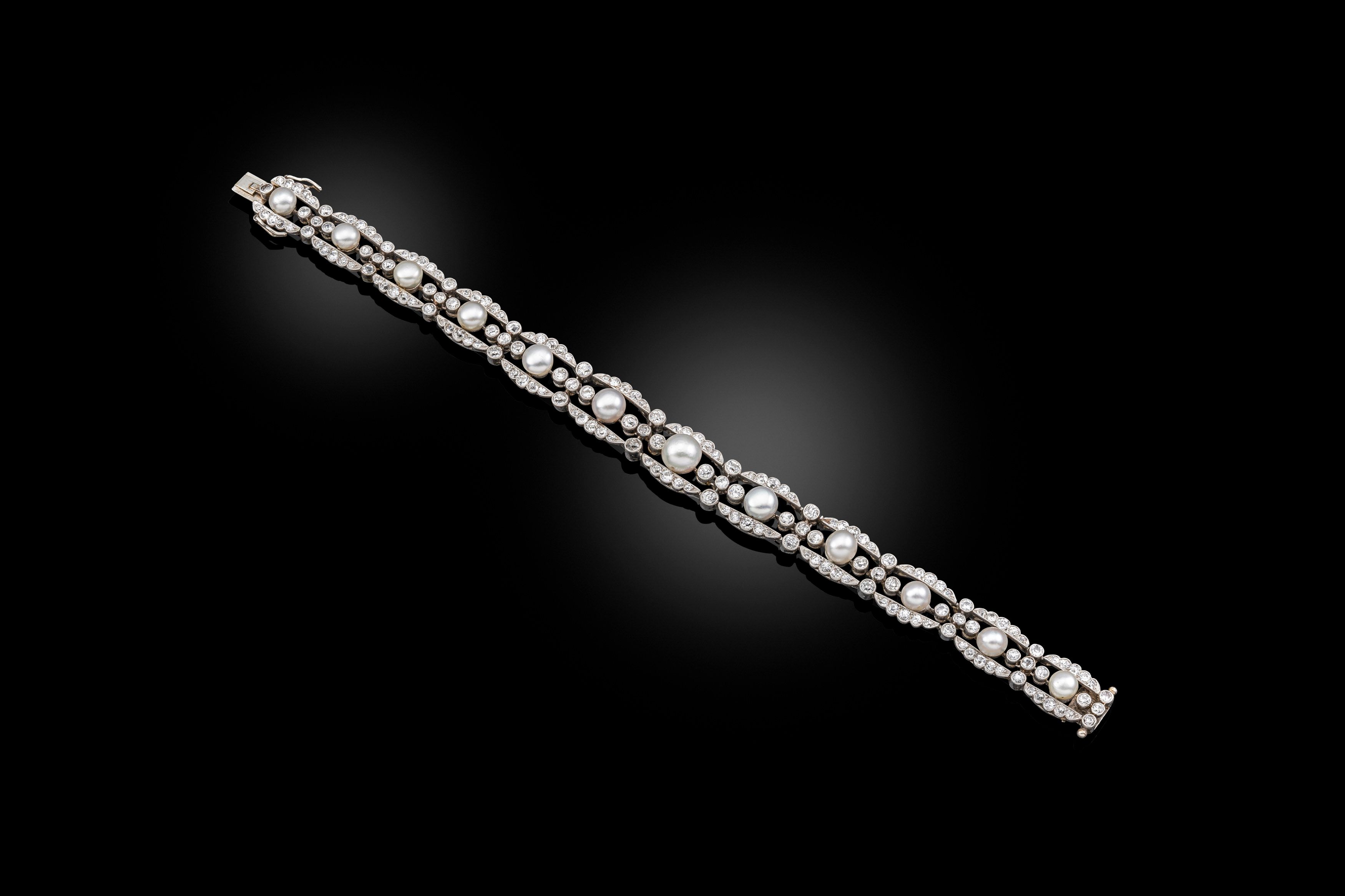 An Early 20th Century Diamond and Natural Pearl Bracelet