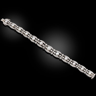 An Early 20th Century Diamond and Natural Pearl Bracelet