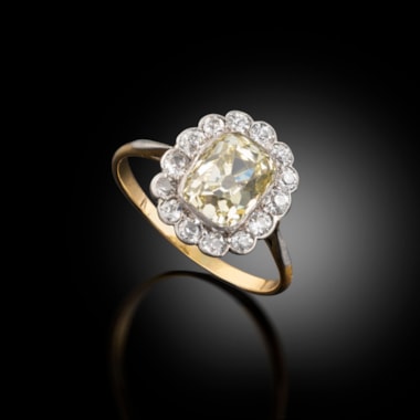 An Antique Yellow Diamond Cluster Ring