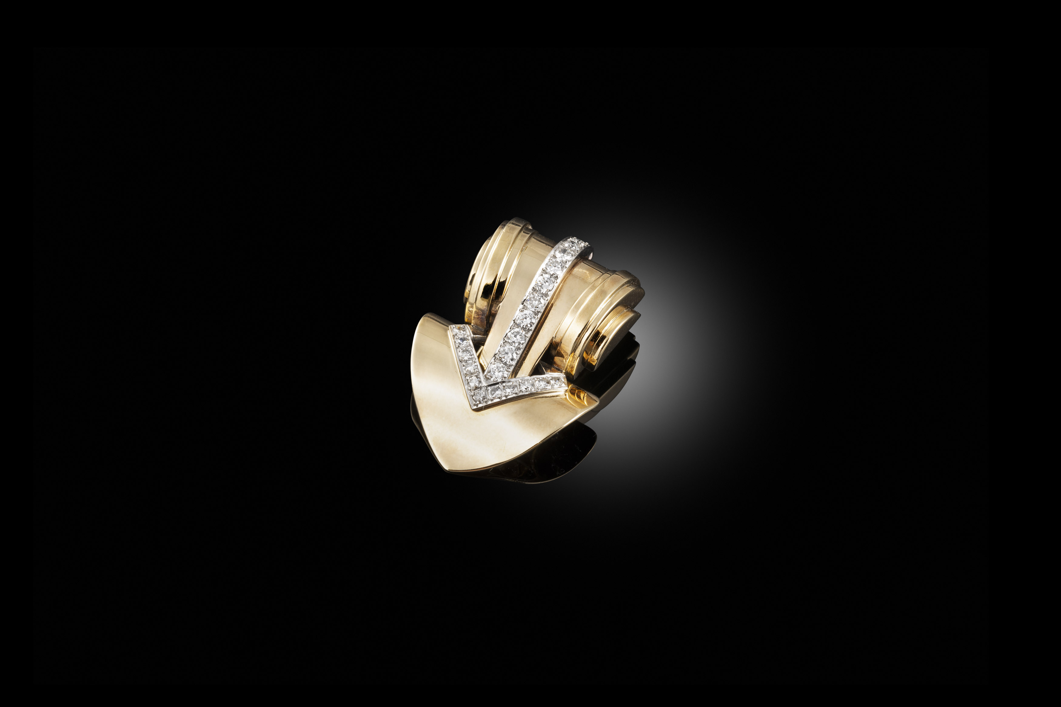 A gold and diamond clip, 1950s