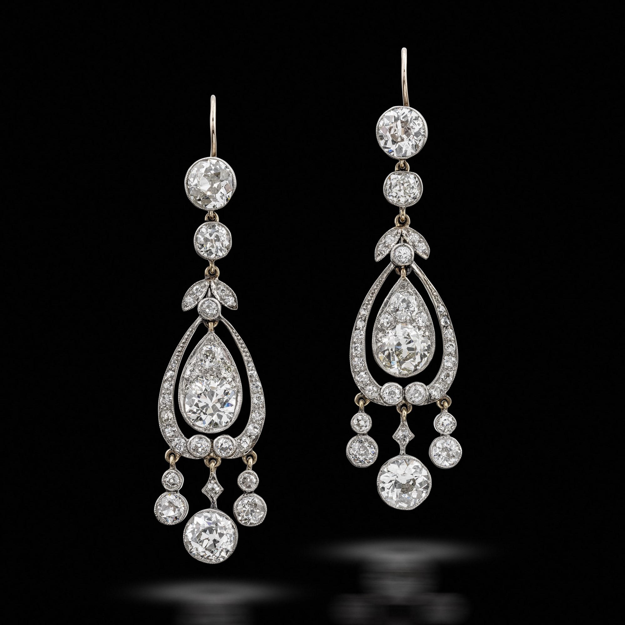 A pair of antique diamond earrings, circa 1900