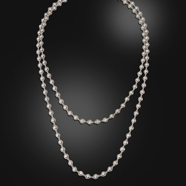 Art Deco platinum and diamond long chain, circa 1920