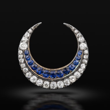 A late 19th century sapphire and diamond crescent brooch