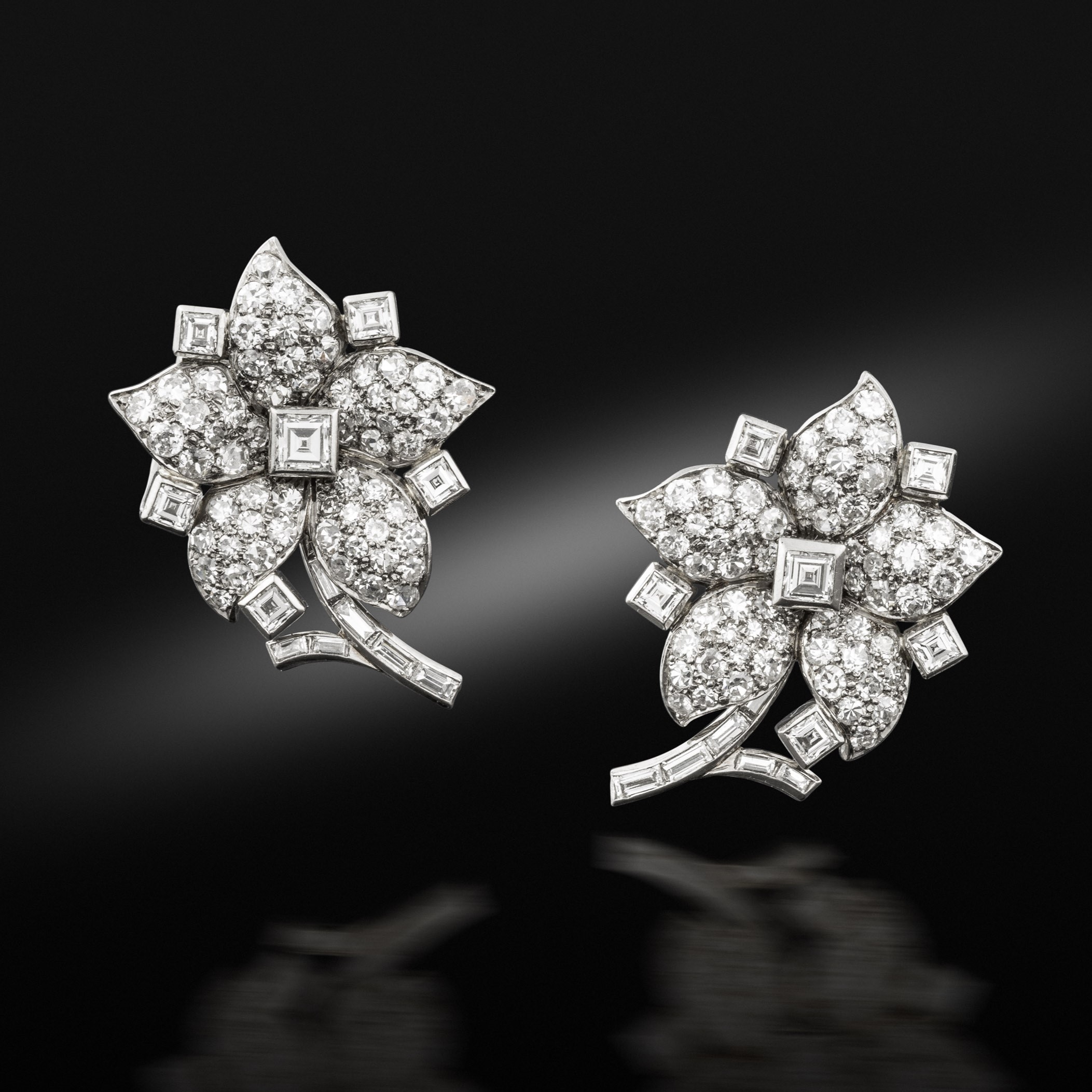Pair of mid-20th century diamond flowerhead and stem earrings, circa 1950