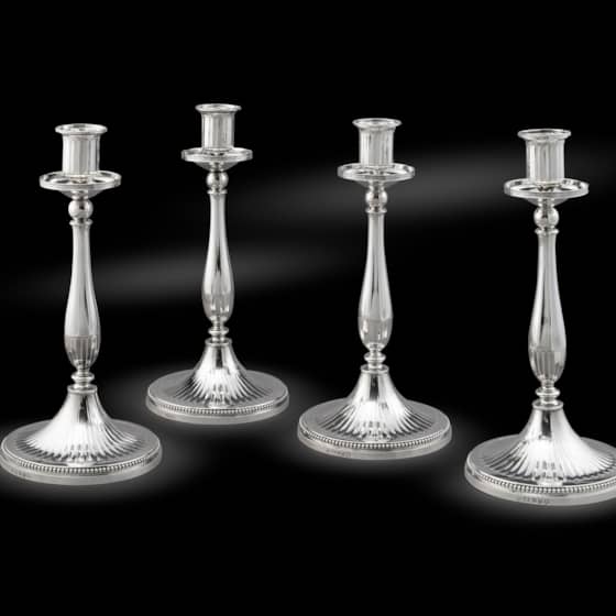 A Set of Four Neoclassical Late 18th Century Candlesticks