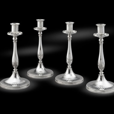 A Set of Four Neoclassical Late 18th Century Candlesticks