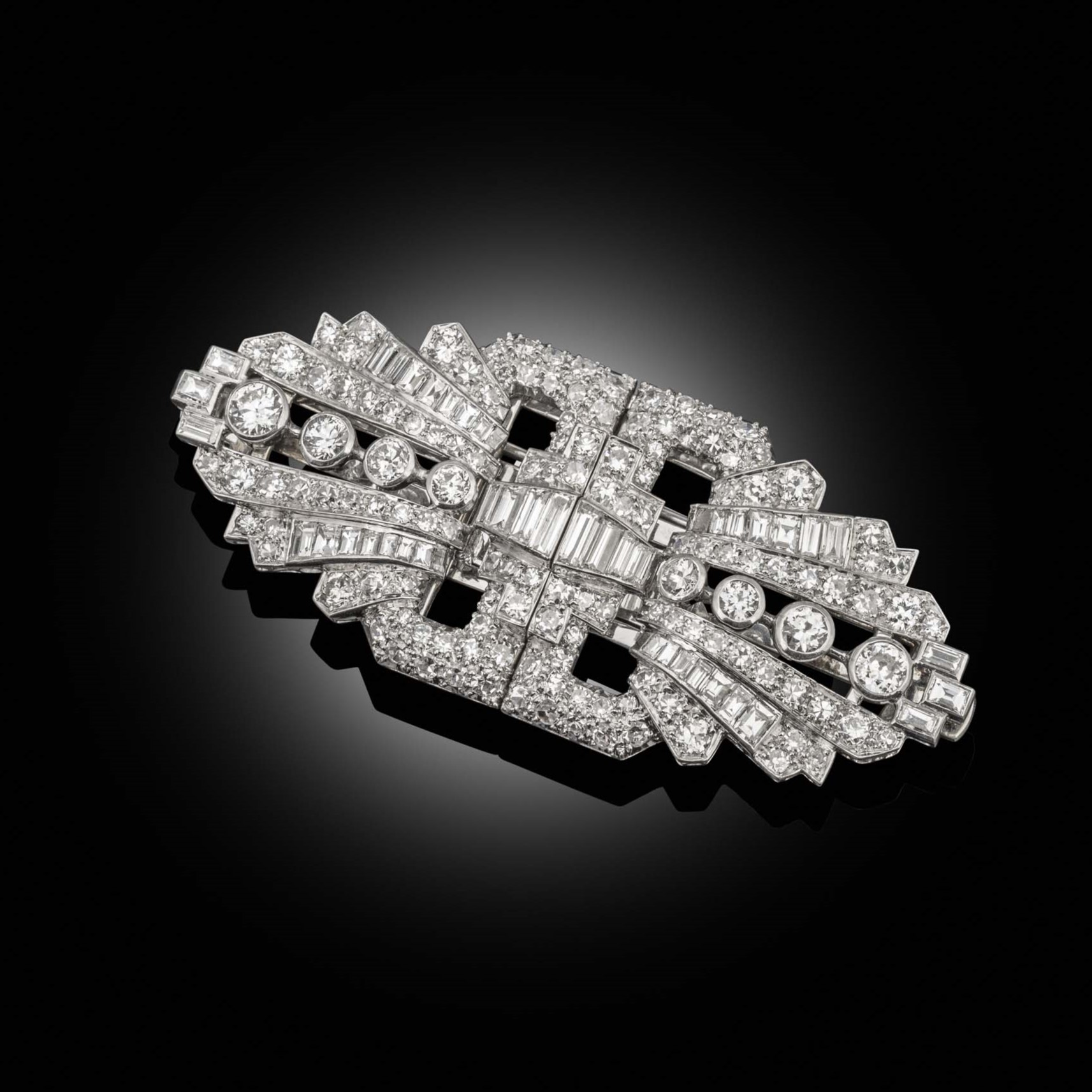 An art deco diamond double clip brooch