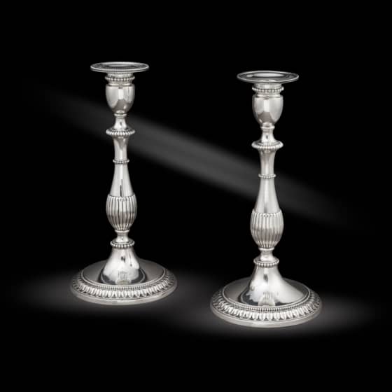 A Pair of Late 18th Century Neo-Classical Candlesticks