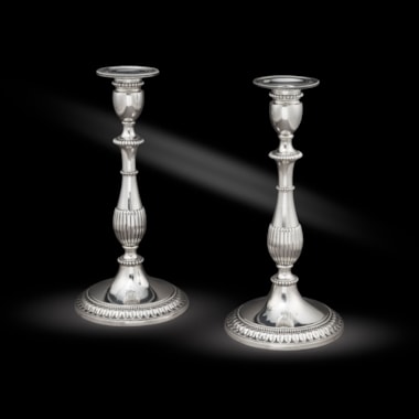 A Pair of Late 18th Century Neo-Classical Candlesticks
