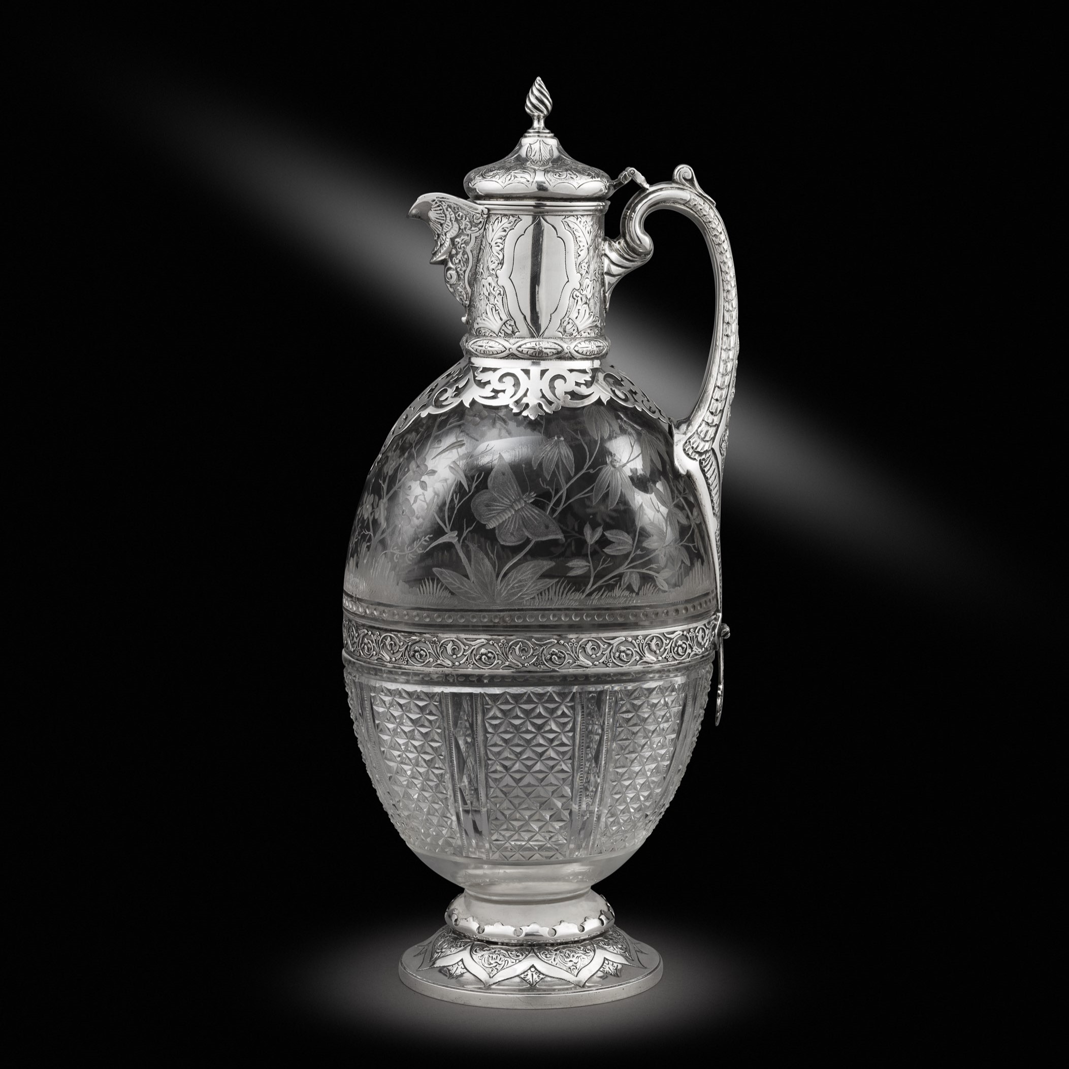 A Victorian Silver Mounted Etched, Engraved and Cut-Glass Claret Jug