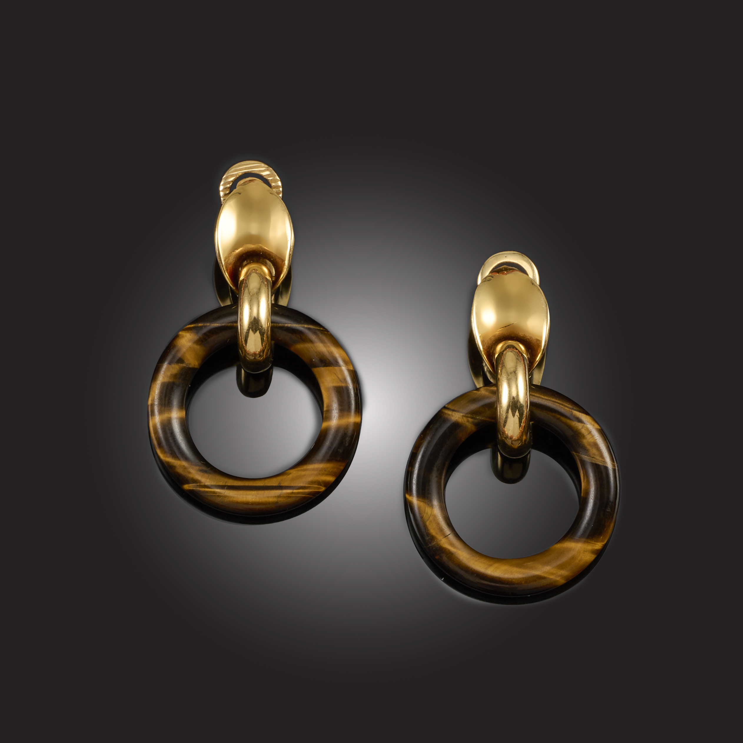 A pair of 1970s 18k gold and tigers eye earrnings 