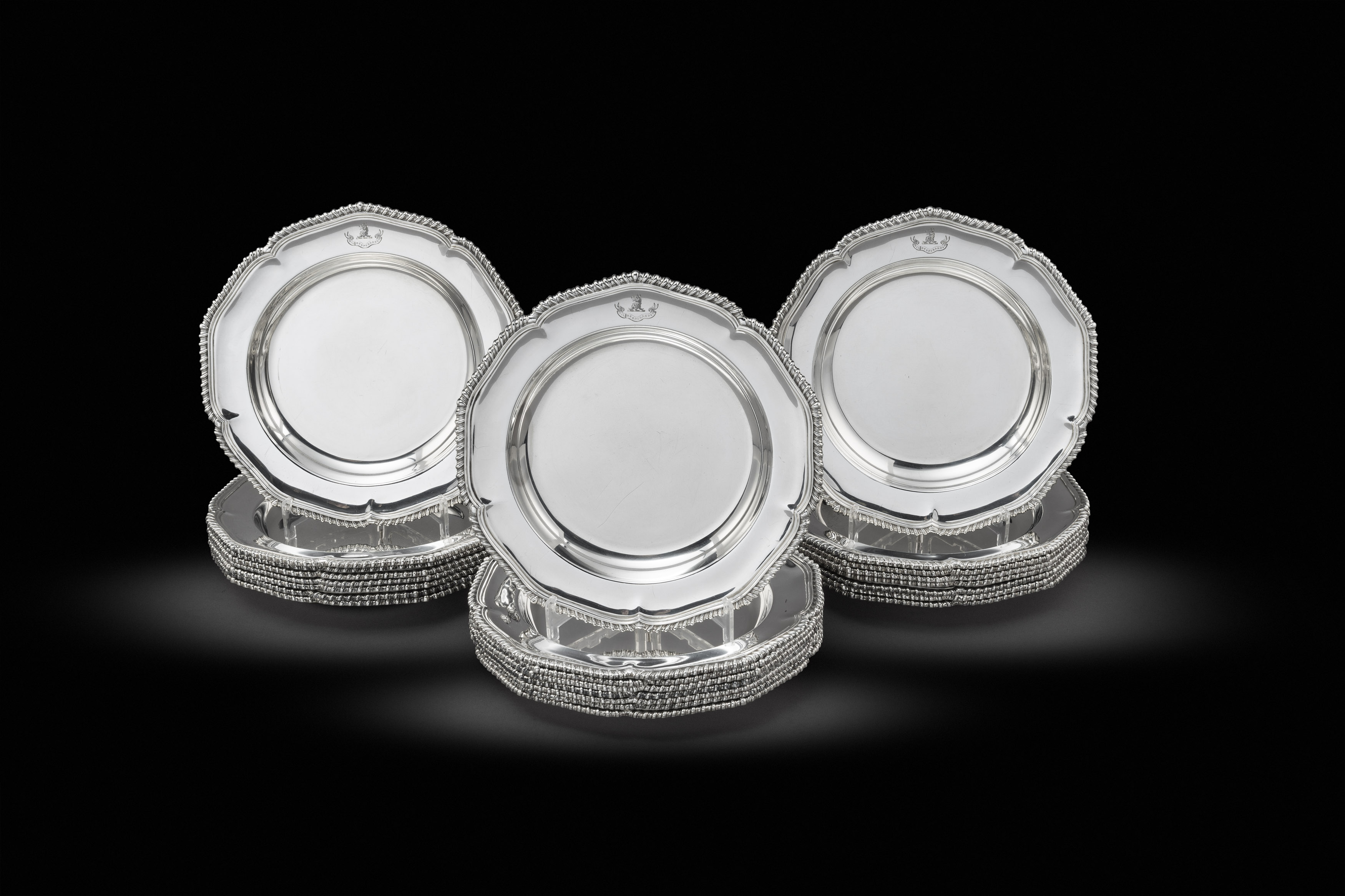 A set of twenty-four Victorian silver soup plates