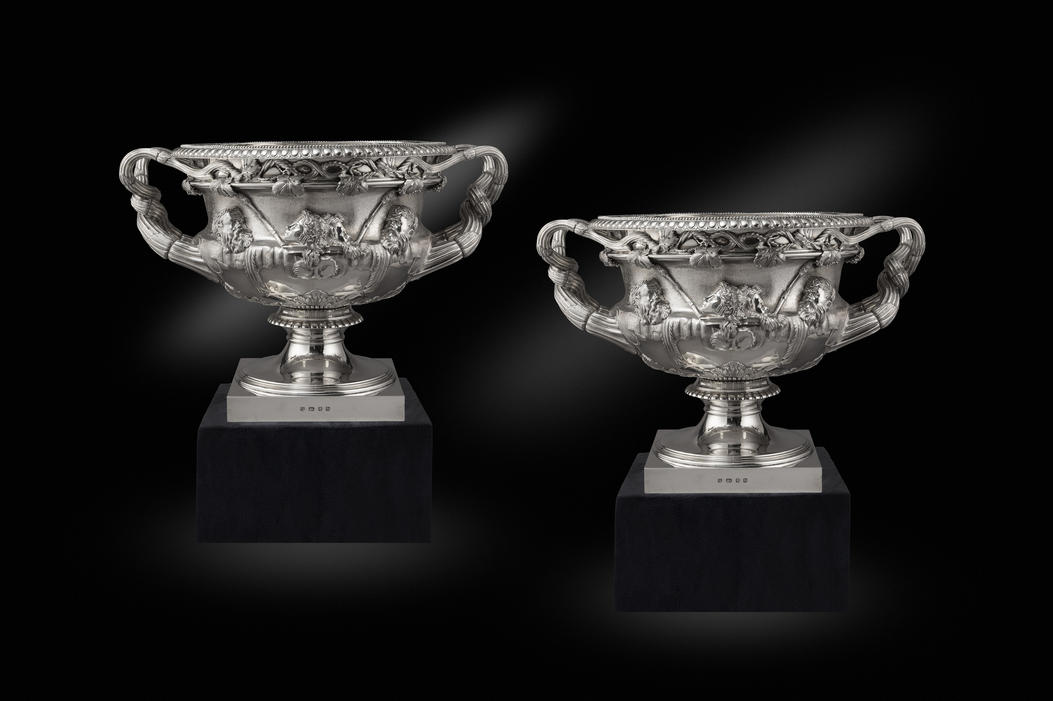 A pair of Monumental  silver Warwick vases