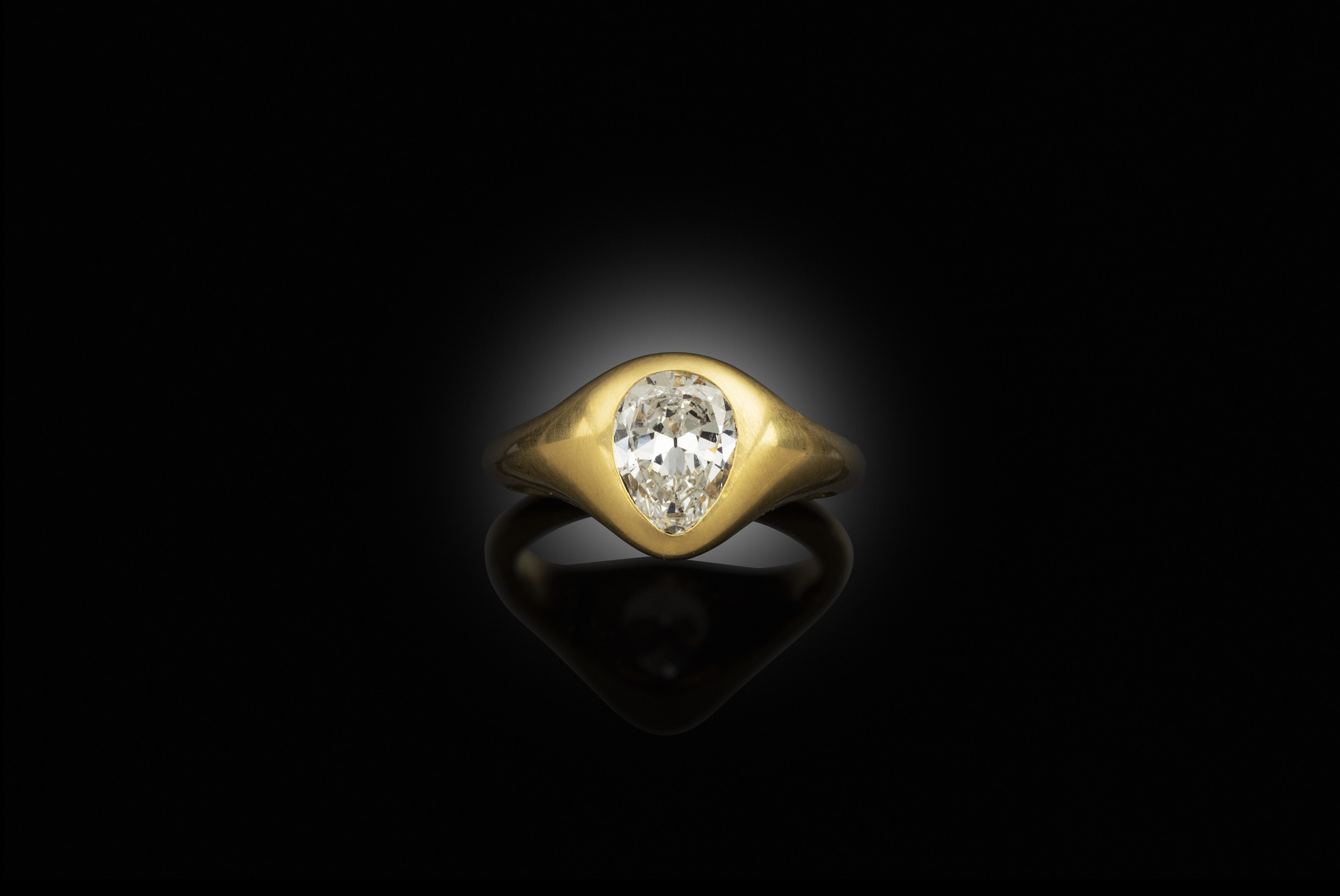 A gold and diamond ring