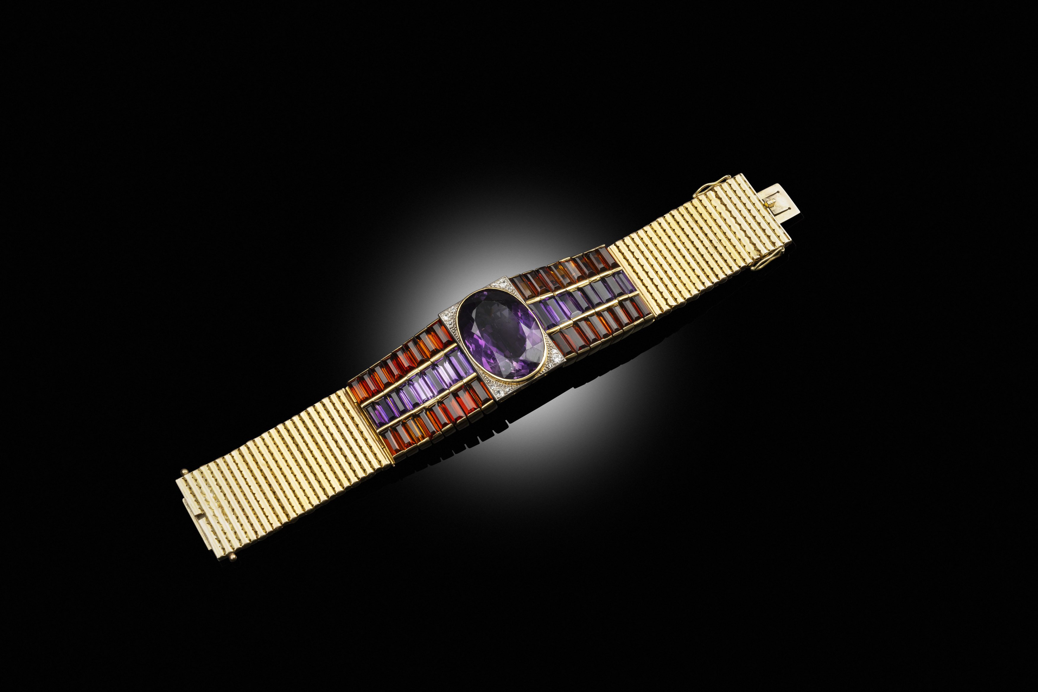 A retro amethyst and citrine bracelet, circa 1980